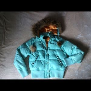 Stylish teal jacket.